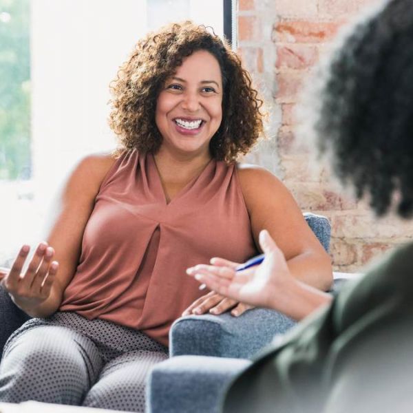 Two women having a conversation about how to find a PCP.