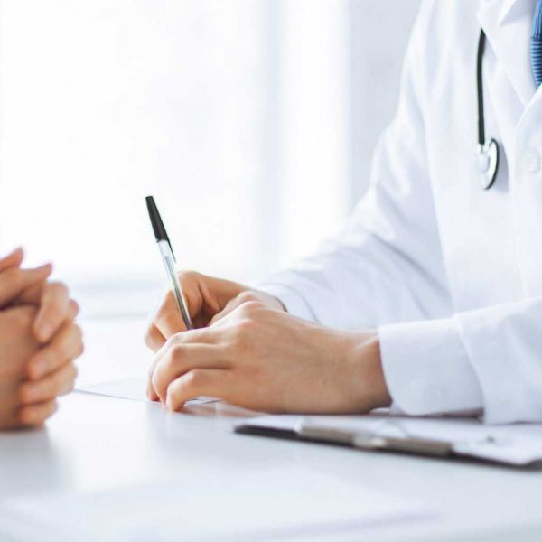 outpatient rehab doctor and patient