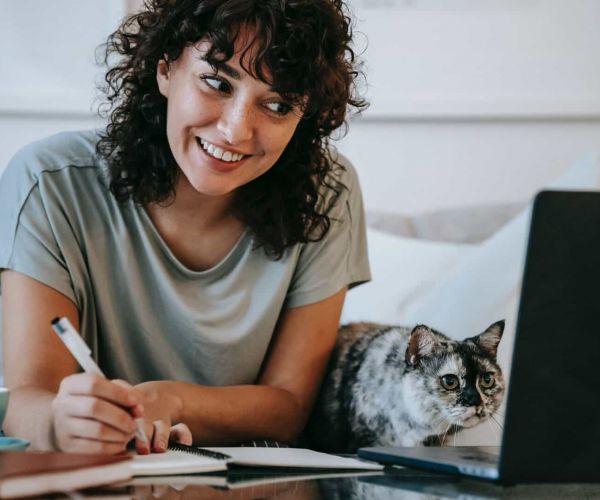 Young woman smiles as she is no longer struggling with mental health because of the treatment at Freeman Health Partners