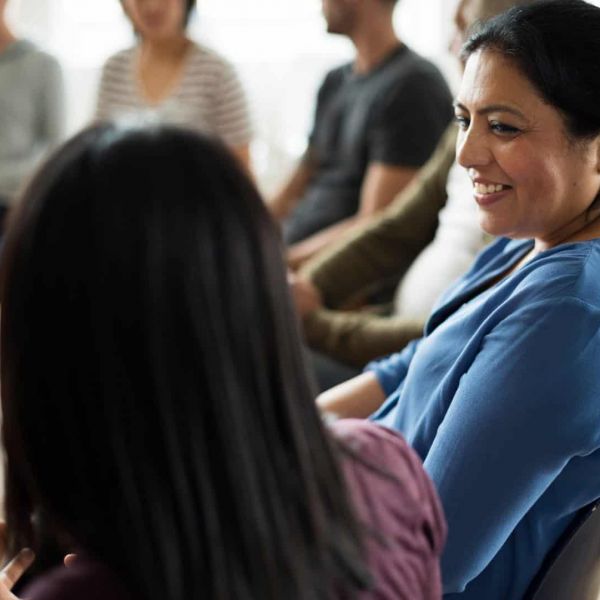 clients meet up for continuing care covered by Aetna